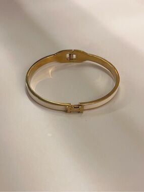 Gold and white women’s H Bracelet